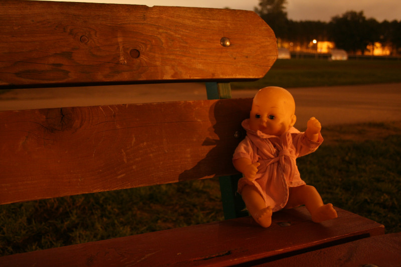 Doll on a parkbench