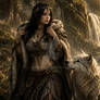Tribal Huntress with White Wolf by Waterfall