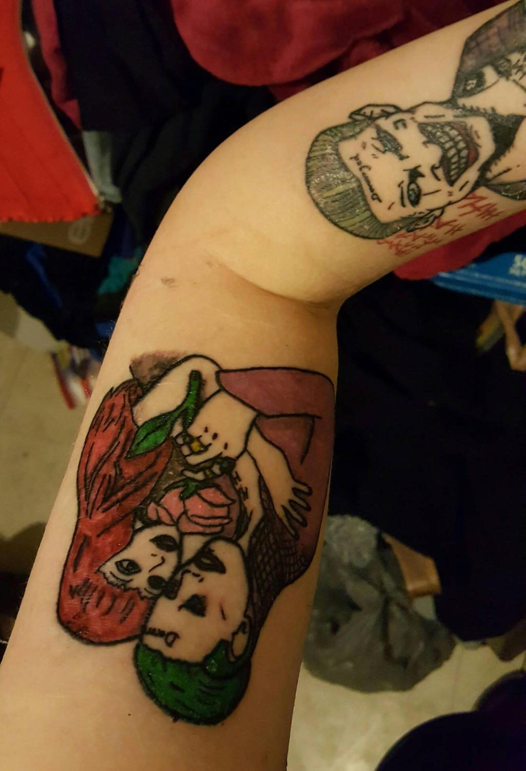 JOKER tattoo upper arm 