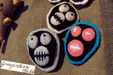 neon and glitter Boosh badges