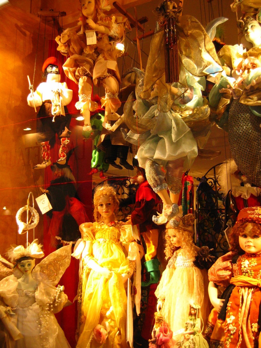 Dolls in a window 3