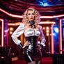 Buxom young crossdresser in corset