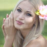 blonde with flower in hair