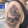Skull with butterfly by Roger Axelsson