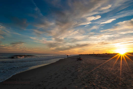 Sun Setting by the Sea