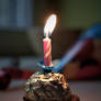 Lonely birthday cake with fire