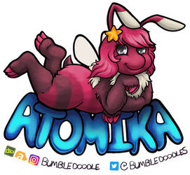 Atomika Badge