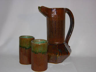 Pitcher with cups