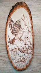 Birds on a wooden bucket - pyrography