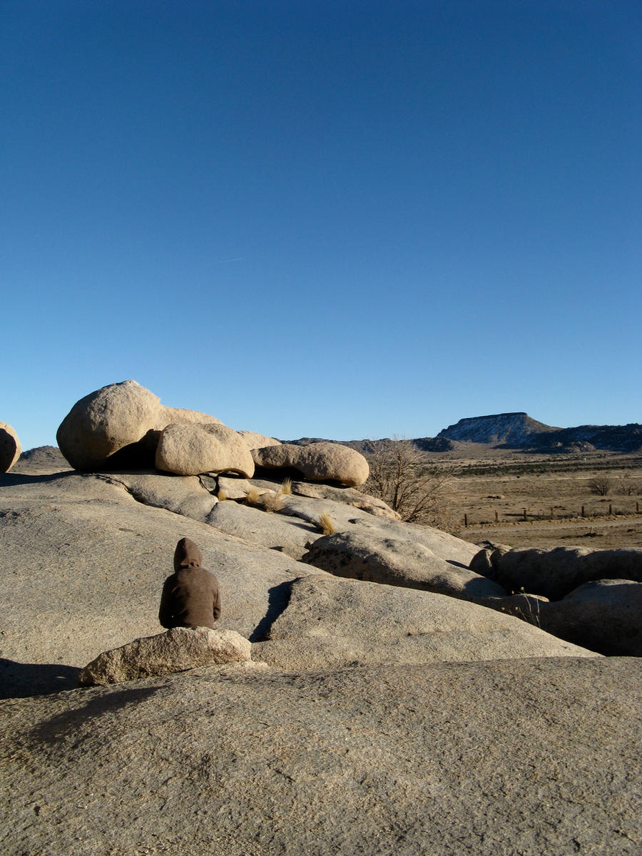 With the empty sky and stones