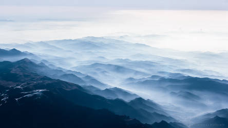 Clouds chasing the alps