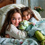 in-a-cozy-bedroom-setting-a-young-girls-with-toy