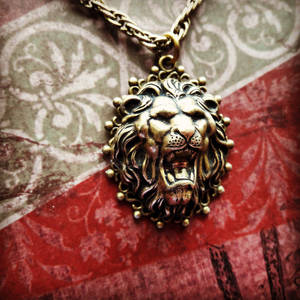 Brass roaring lion pendant