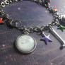 The Outer Worlds charm bracelet detail