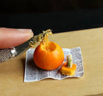 Gutting the smallest of pumpkins by fairchildart