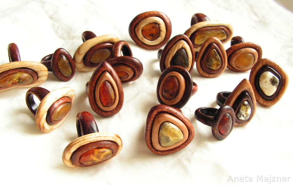 Wooden rings with natural Baltic amber