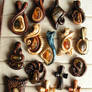 Wooden pendants with Baltic amber