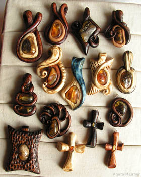 Wooden pendants with Baltic amber