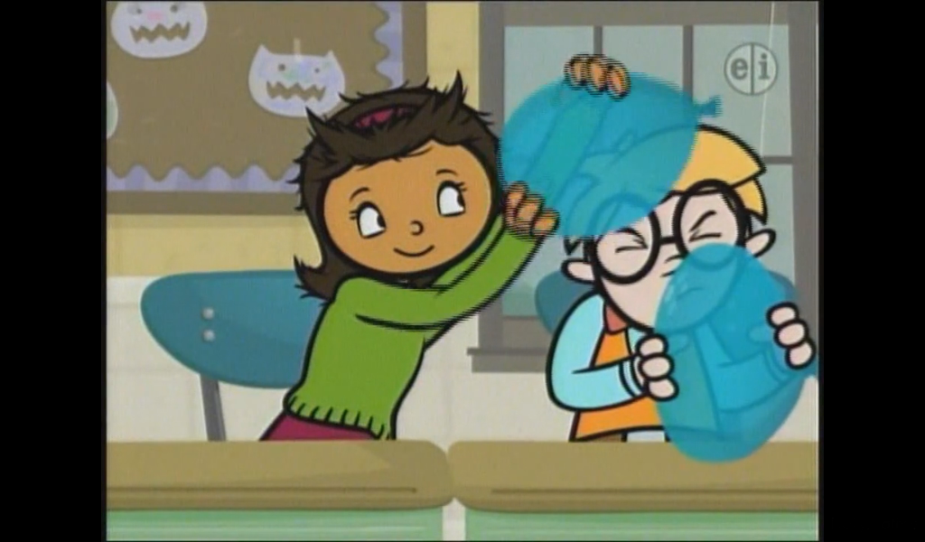 Becky rubs a ballon on Tobey's hair