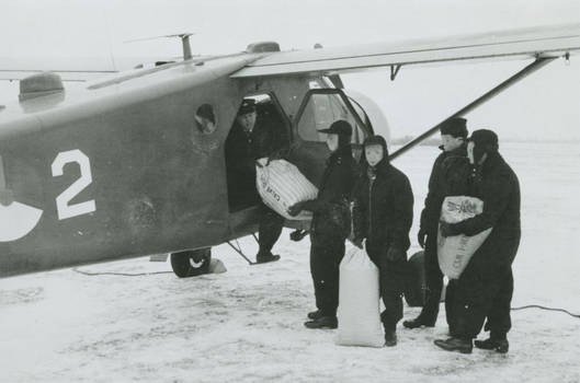 Turgisse people loading Indium Salts on a plane.