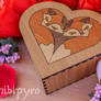 Heart shaped box with foxes marquetry