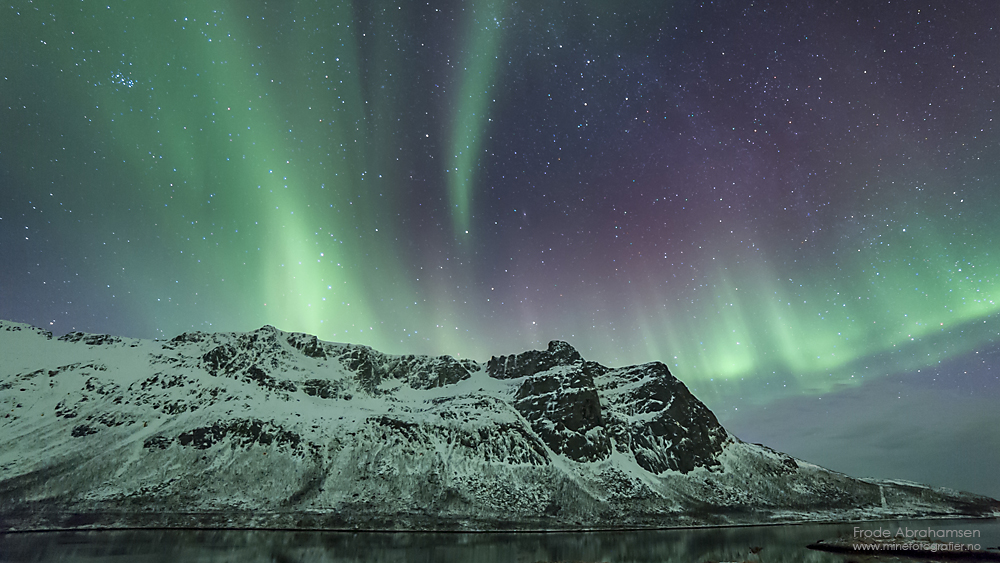 Northern lights above the mountains