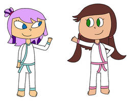 Darcy and Maple in karate uniforms
