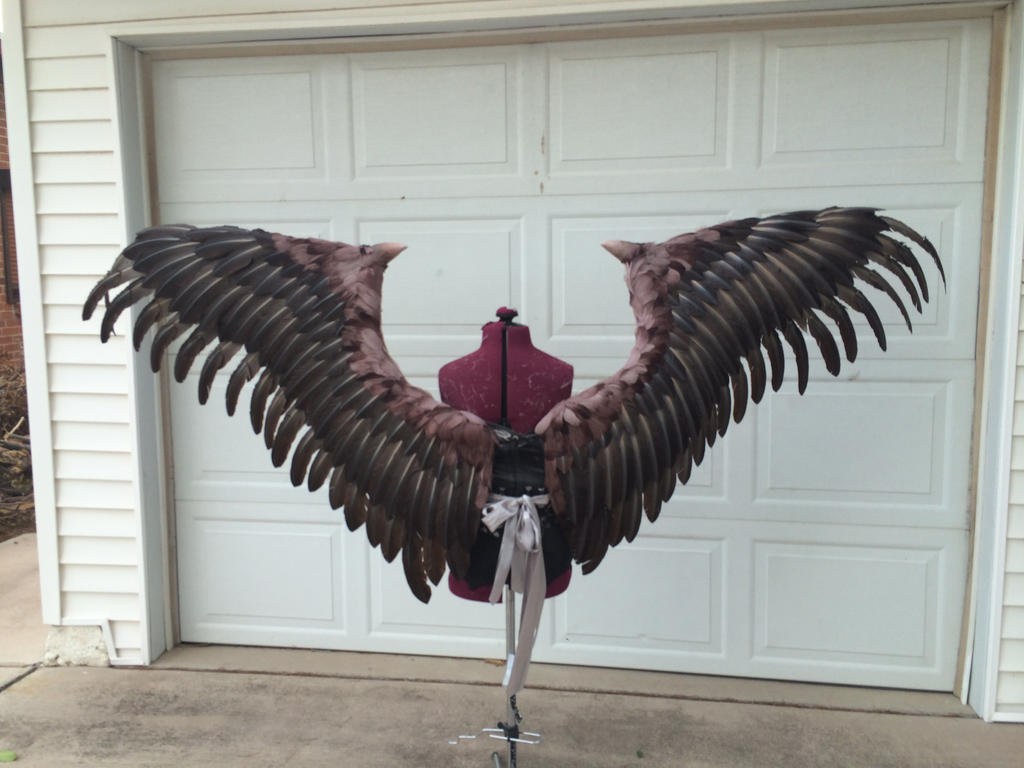 Maleficent wings back by TheGriffinQueen