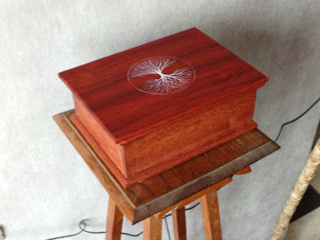 wooden box with treepainting