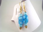 Blue cats eye and Flower Dangle Charm Earrings by GlitzSis