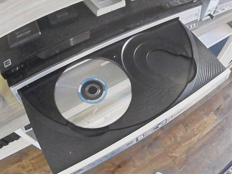 Katie Cadet's 5 disc Changer with disc in tray