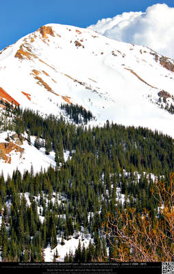 Red Mountain Covered In Snow
