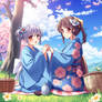 Two Girls In Blue Kimonos Having A Picnic Together