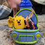 Wubbzy and Olivia riding in the 4 in 1 Wubbmobile