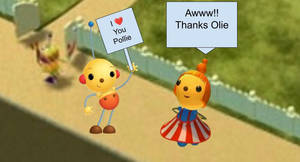 Olie holds a I Love You Sign for Pollie