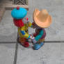 JoJo and Skeebo figures holding hands