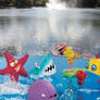 Rubbadubbers playing in a lake