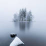 Island at the frozen lake