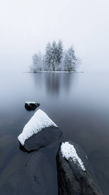 Island at the frozen lake