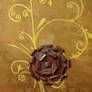 Metal flower on canvas.