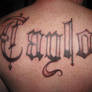 Back lettering tattoo TAYLOR