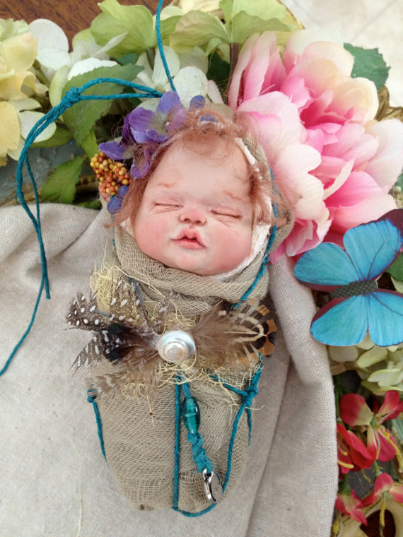 Nature Pixie baby girl with auburn/brown hair