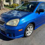 Blue Suzuki Aerio SX in Riverside, California