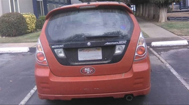 Suzuki Aerio SX with a San Francisco 49ers sticker