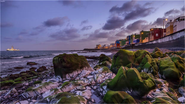 Green rocks after sunset