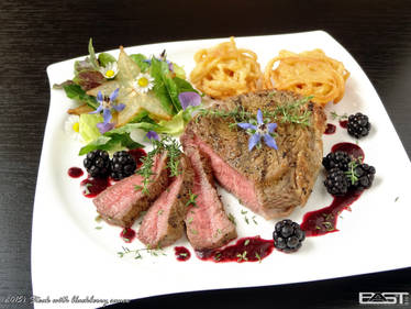 Steak with blackberry sauce