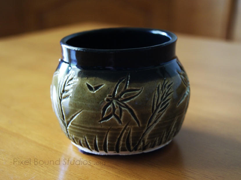 Green and Black Wetlands Themed Ceramic Vase by pixelboundstudios