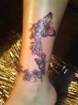 vine flower butterfly tattoo
