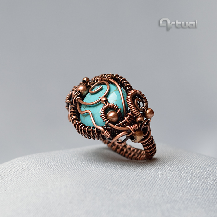 Wire wrapped ring with turquoise cabochon
