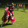 knight on a horse with a spear on attack